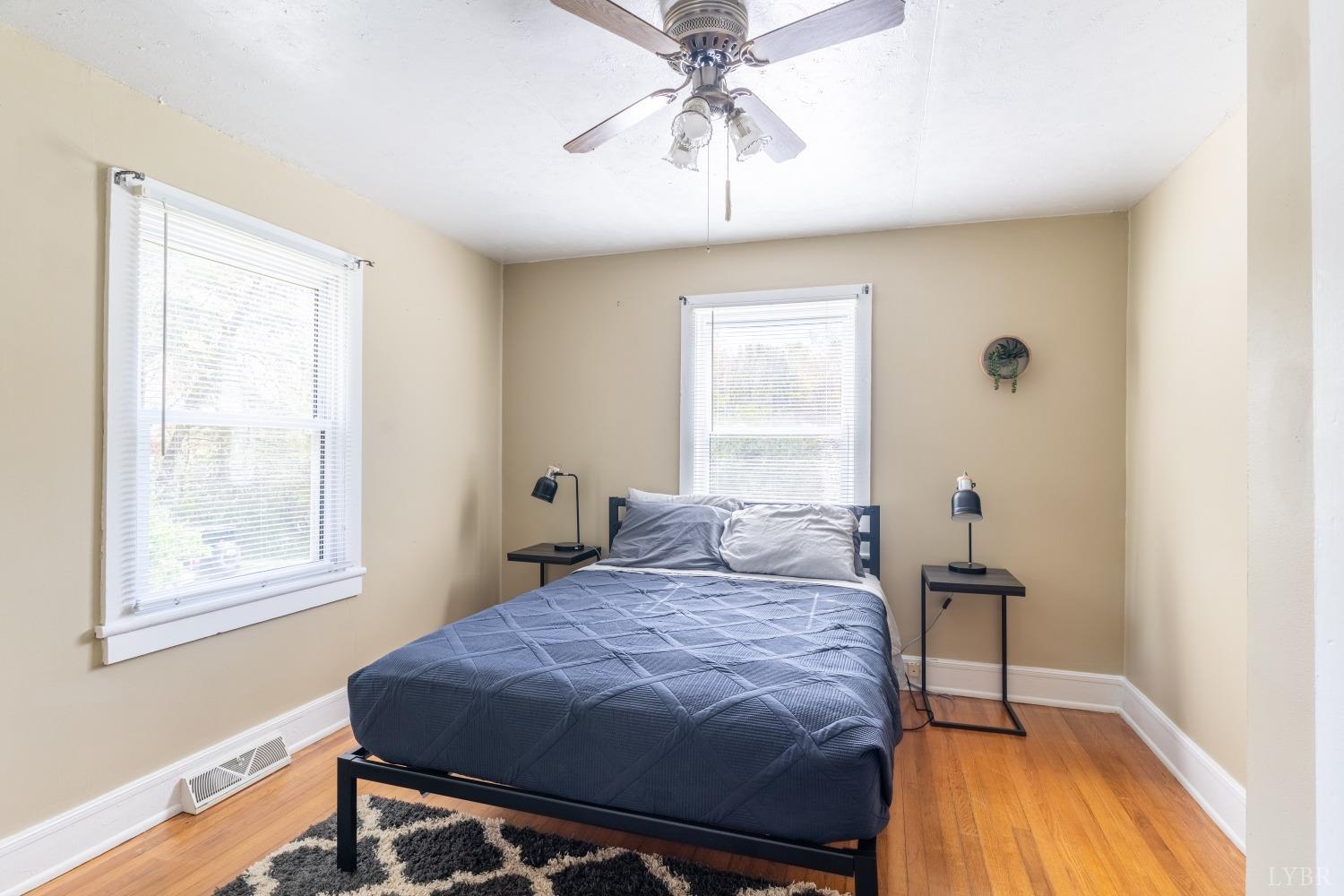 3676 Depot Road Rustburg, VA 24588 - Photo 18 of 37 a bedroom with a bed and a window