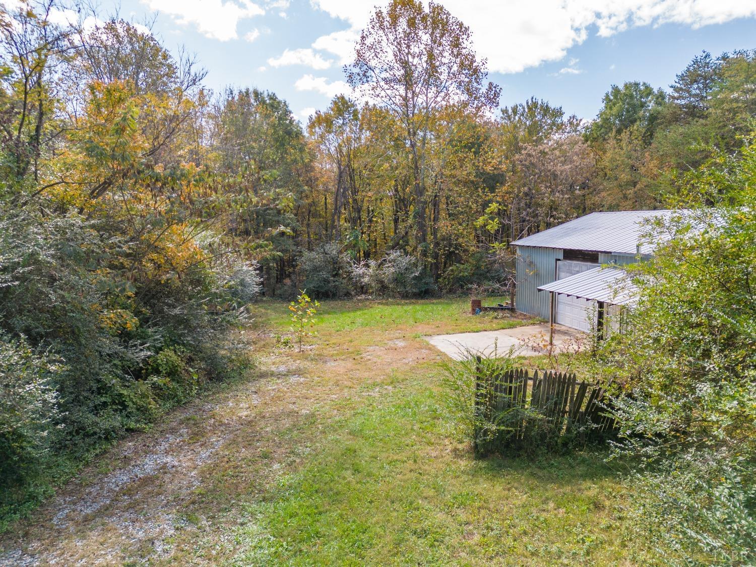 3676 Depot Road Rustburg, VA 24588 - Photo 35 of 37 a view of a house with a yard and sitting area