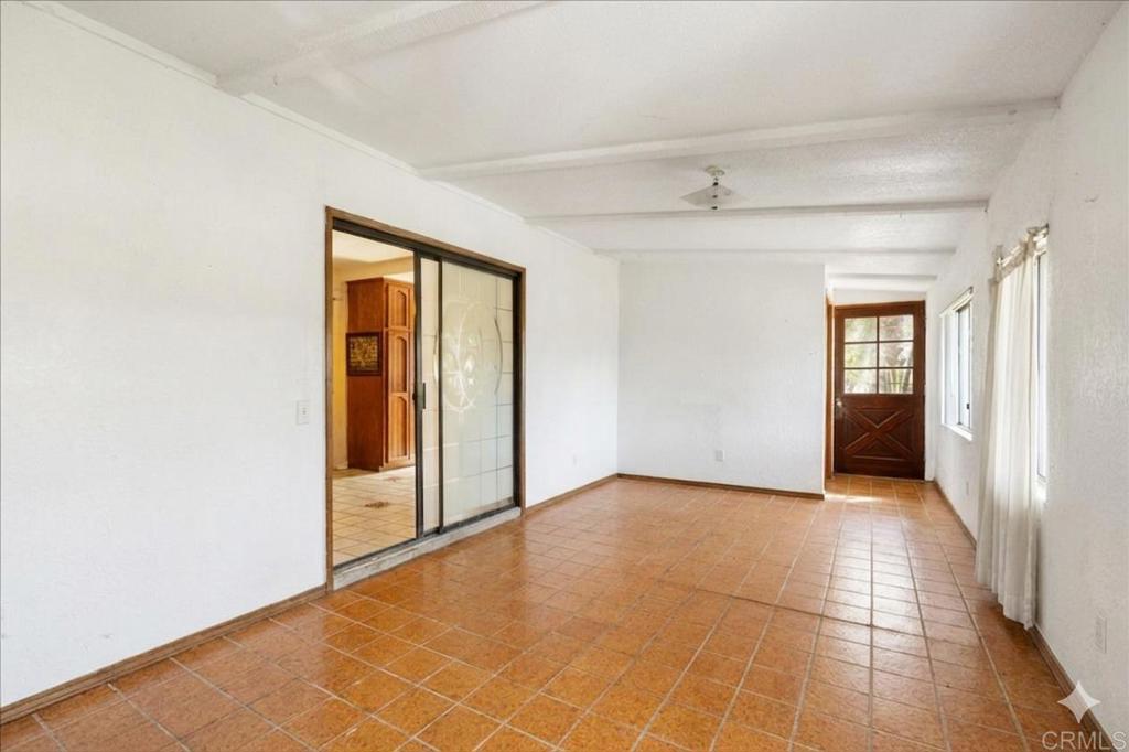 823 Rice Canyon Road Fallbrook, CA 92028 - Photo 17 of 30 an empty room with windows and closet