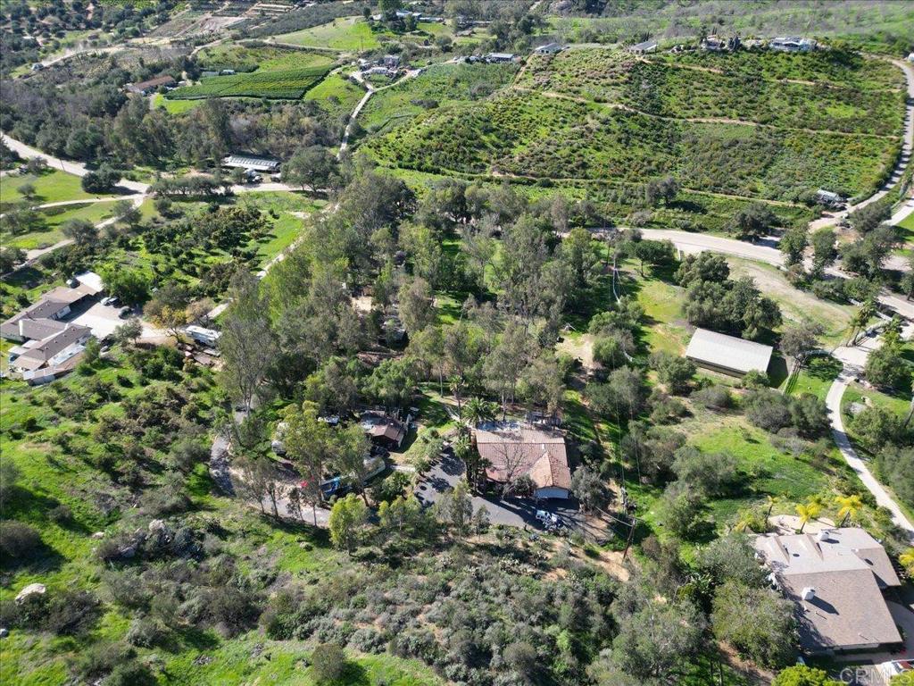 823 Rice Canyon Road Fallbrook, CA 92028 - Photo 3 of 30 a view of a house with a yard