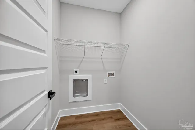 a spacious bathroom with a granite countertop sink a mirror and shower