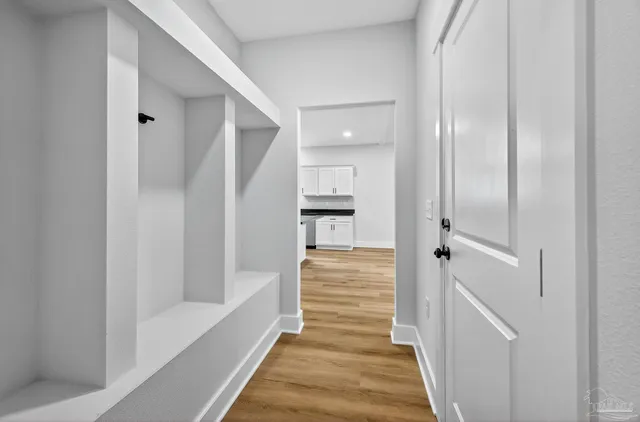 a bathroom with a bathtub and a toilet