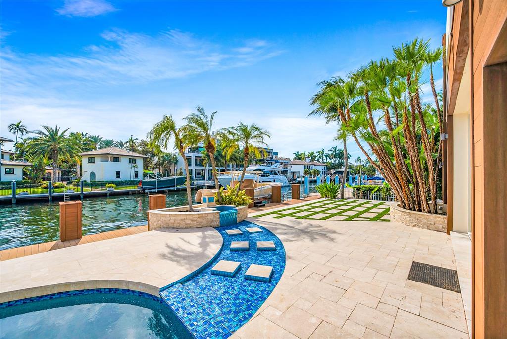 2626 Castilla Isle Fort Lauderdale, FL 33301 - Photo 11 of 18 a view of swimming pool with outdoor seating and plants