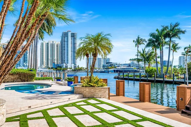 a house with palm tree in front of it