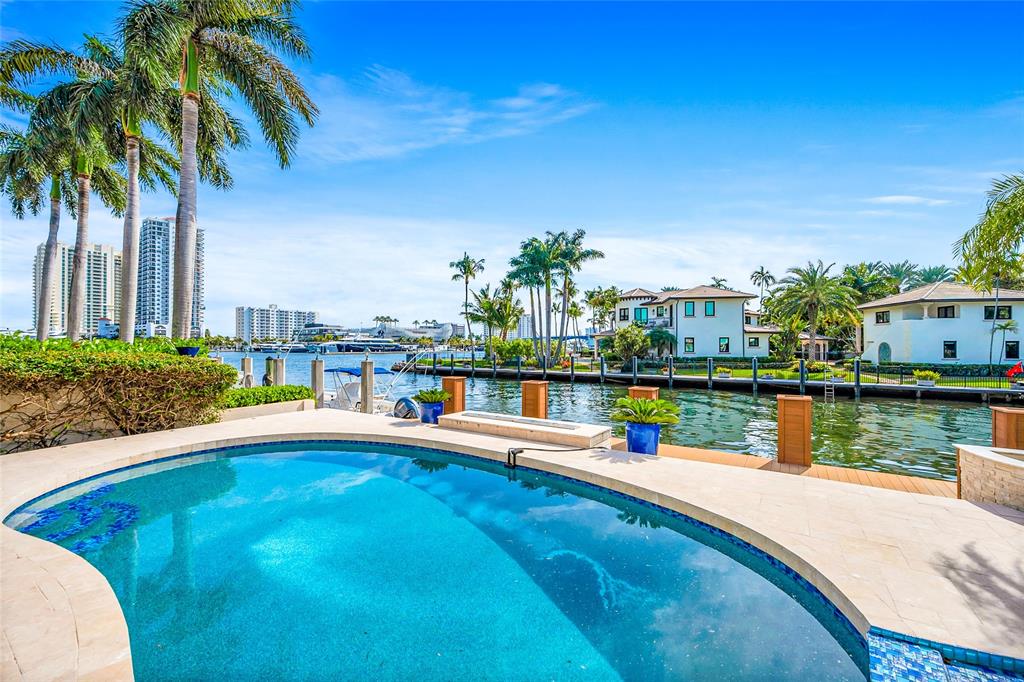 2626 Castilla Isle Fort Lauderdale, FL 33301 - Photo 8 of 18 a view of a swimming pool with a lake view