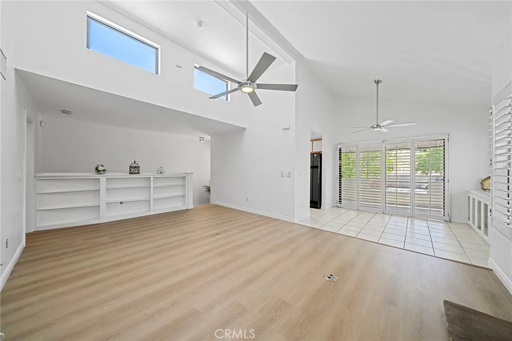 4277 Las Virgenes Road Calabasas, CA 91302 - Photo 2 of 28 Living room opens to the bright dining area which opens to the covered patio for indoor and outdoor living.