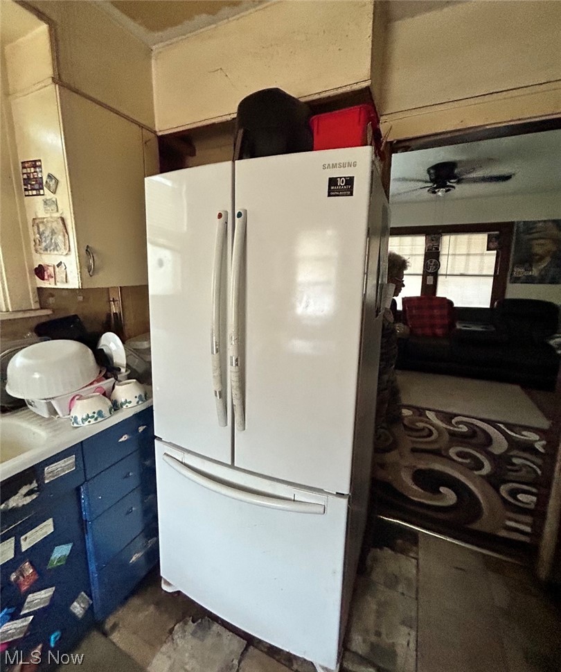 1450 Clearaire Road Cleveland, OH 44110 - Photo 20 of 27 Kitchen featuring white fridge and ceiling fan