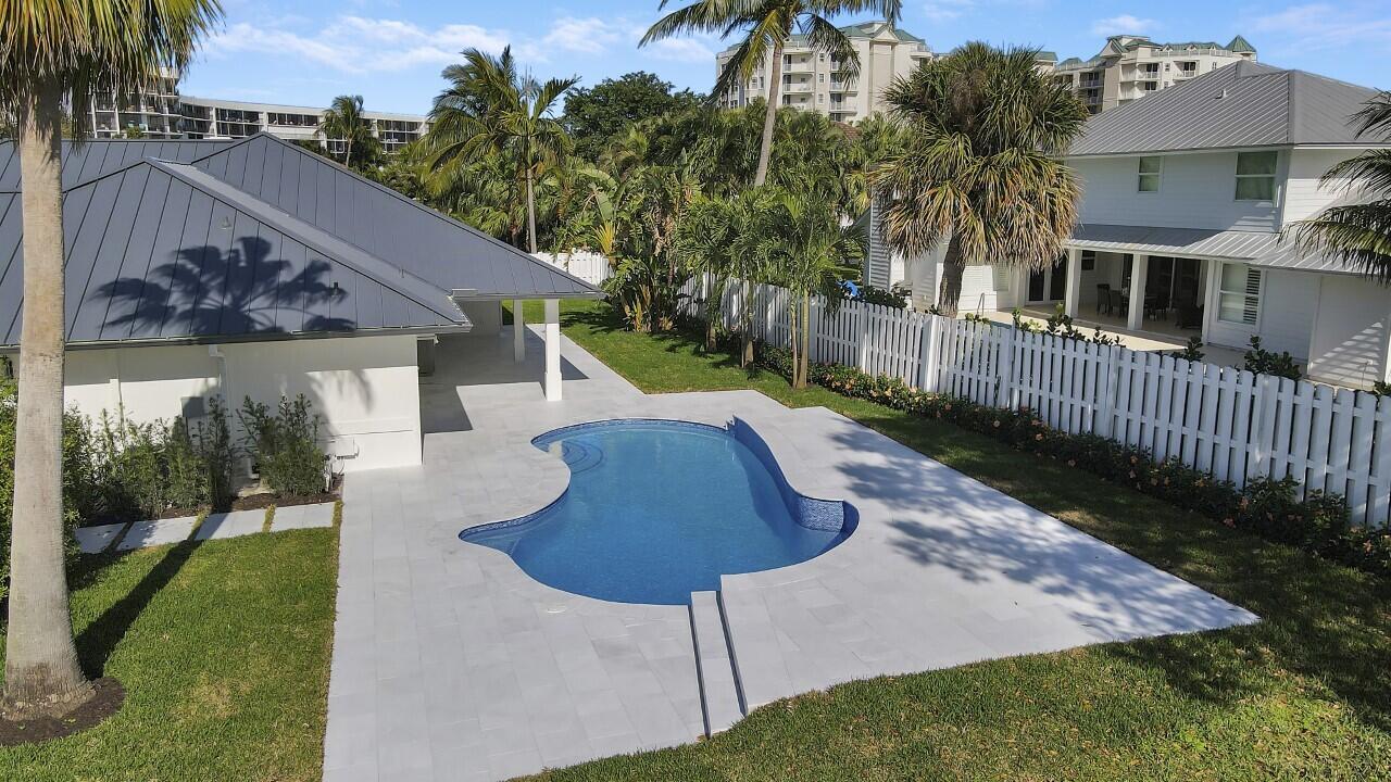 1504 Ocean Way Jupiter, FL 33477 - Photo 15 of 17 a view of backyard of house