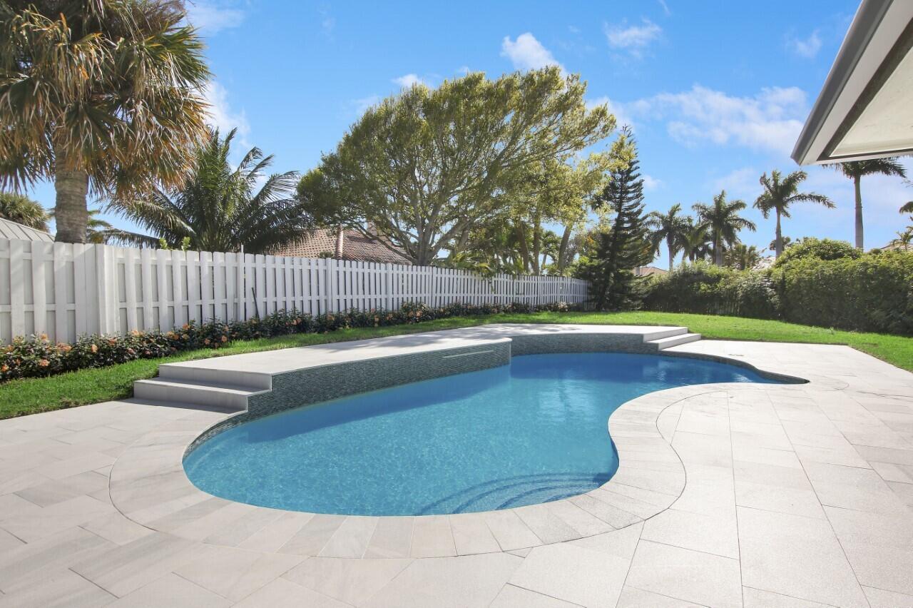 1504 Ocean Way Jupiter, FL 33477 - Photo 16 of 17 a view of swimming pool having outdoor seating