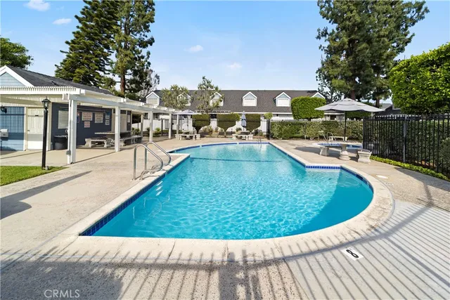 a view of a swimming pool with a patio