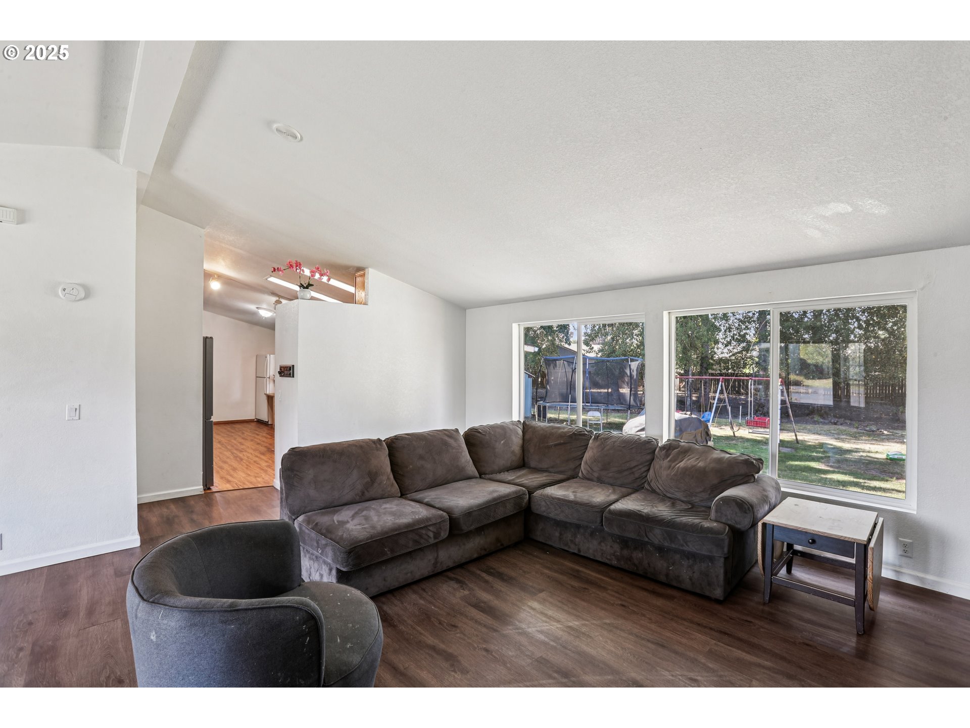 914 James Street Independence, OR 97351 - Photo 13 of 48 a living room with furniture and a large window