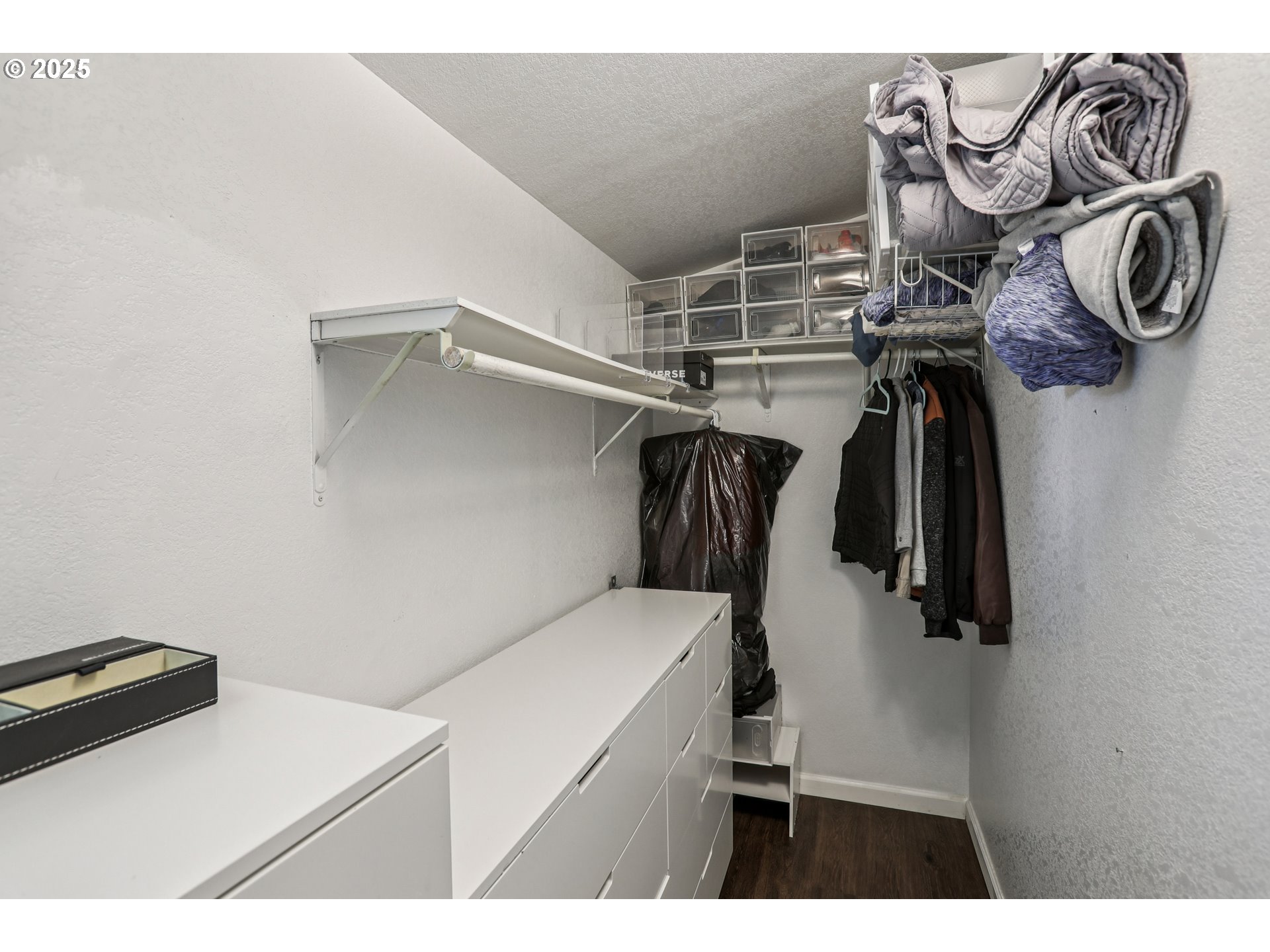 914 James Street Independence, OR 97351 - Photo 28 of 48 a view of walk in closet with clothes and shoes