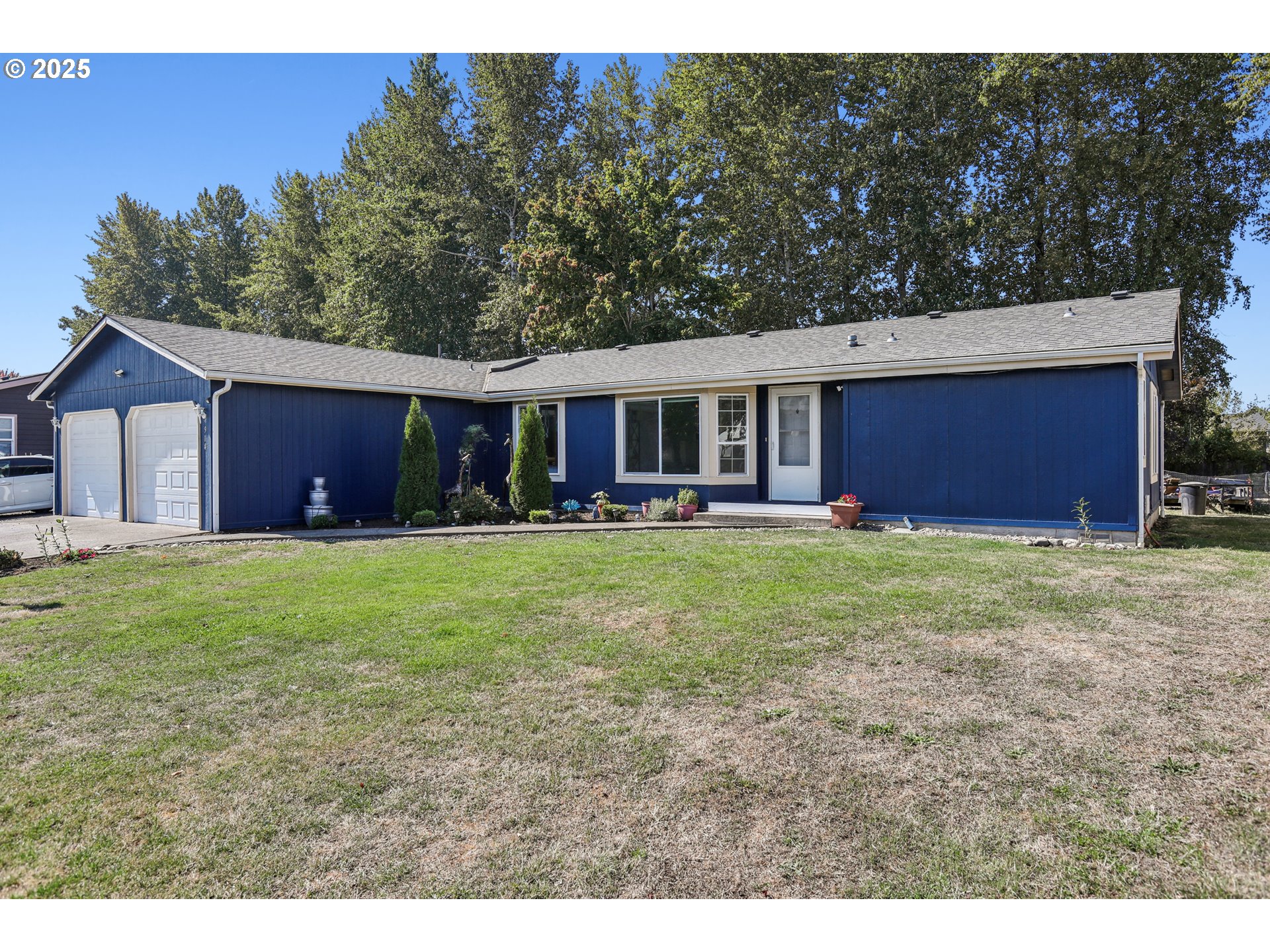 914 James Street Independence, OR 97351 - Photo 3 of 48 a view of a house with a backyard