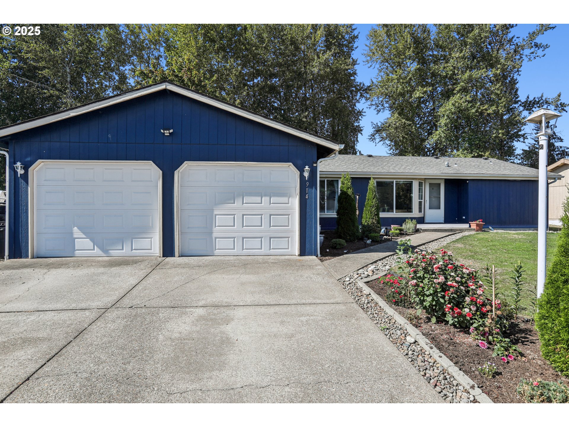 914 James Street Independence, OR 97351 - Photo 7 of 48 a view of a house with a patio