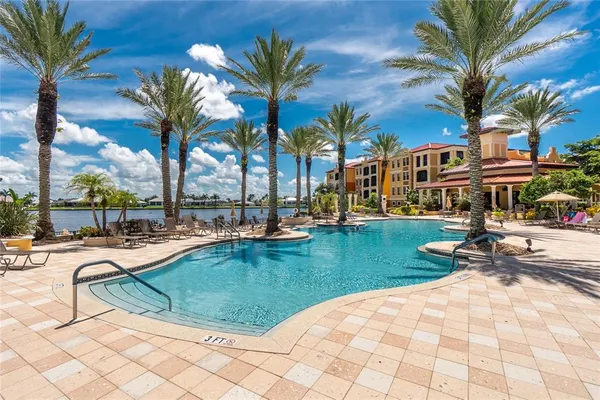 a view of a swimming pool with a bench