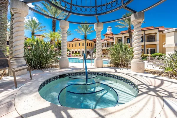 a view of a building with potted plants
