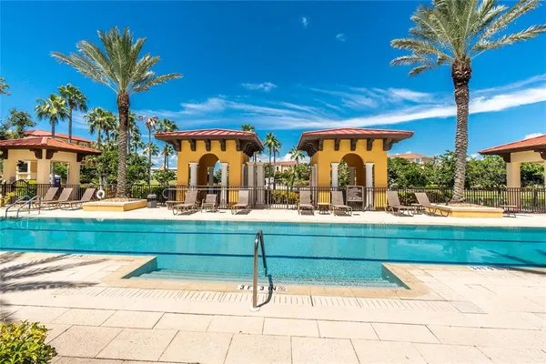 a childrens park with lots of swings and slides