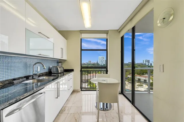 a bedroom with a bed and painting on the wall