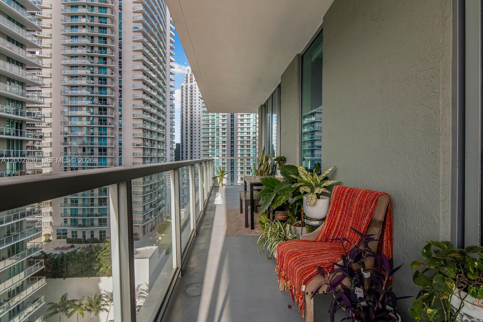 79 Southwest 12th Street, Unit 2107S Miami, FL 33130 - Photo 17 of 47 a view of balcony with potted plant