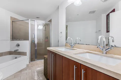 a bathroom with a toilet and a bathtub