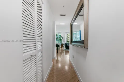 a view of a livingroom with furniture window and front door