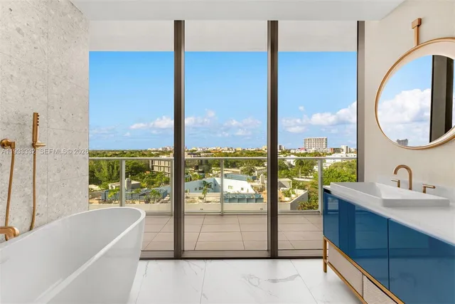 a bathroom with shower and bathtub