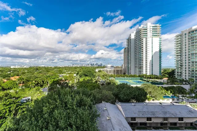 a view of a balcony with a potted plant