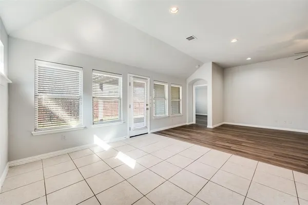a view of an empty room and window