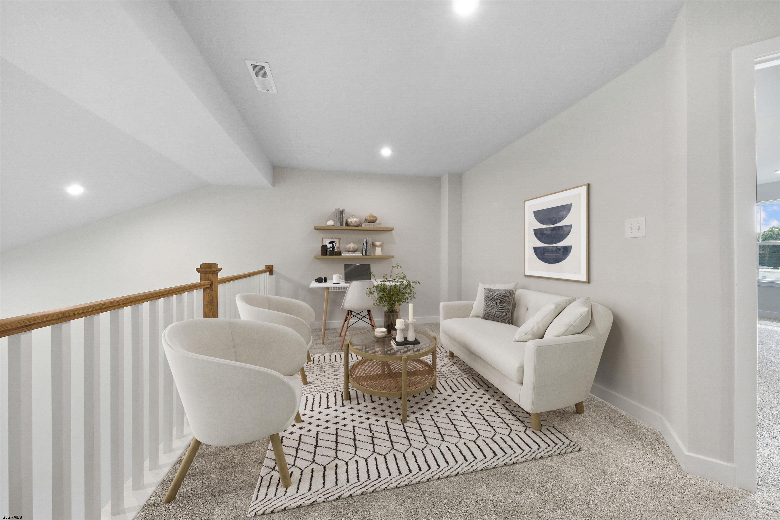 705 Jesse Drive, Unit 705 Somers Point, NJ 08244 - Photo 15 of 15 a living room with furniture a rug and a painting
