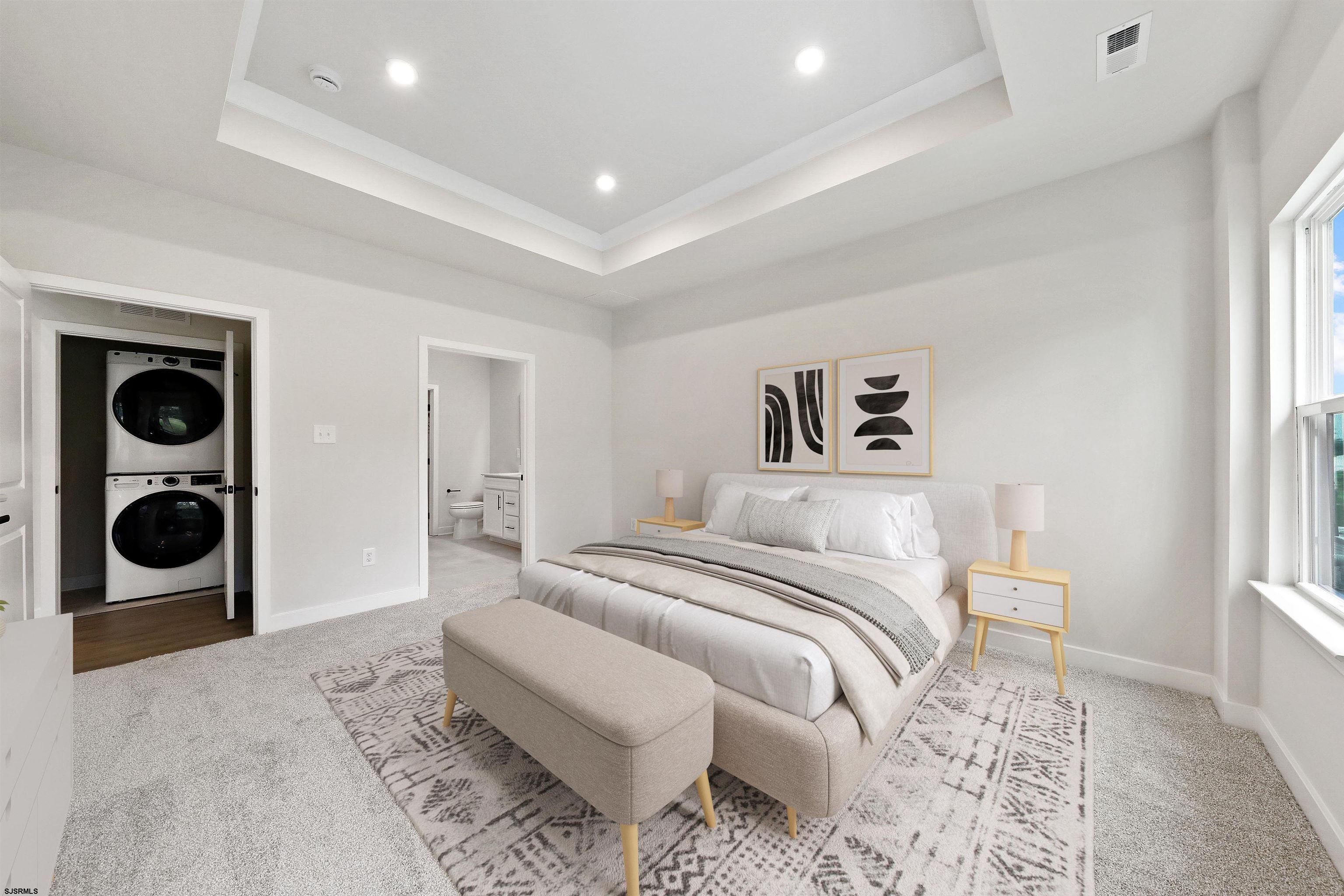 705 Jesse Drive, Unit 705 Somers Point, NJ 08244 - Photo 10 of 15 a bedroom with a bed and a window