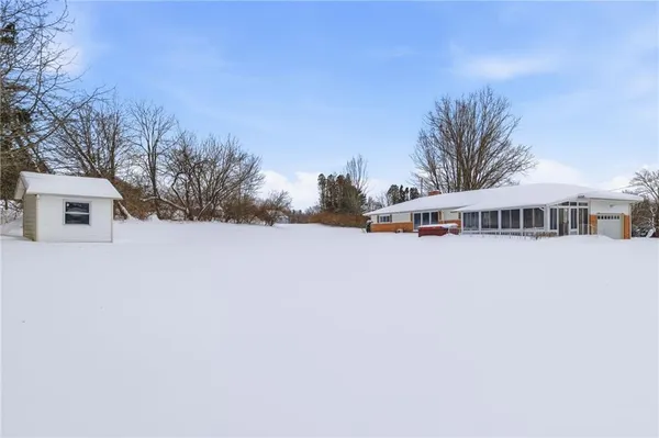 a house with trees in front of it