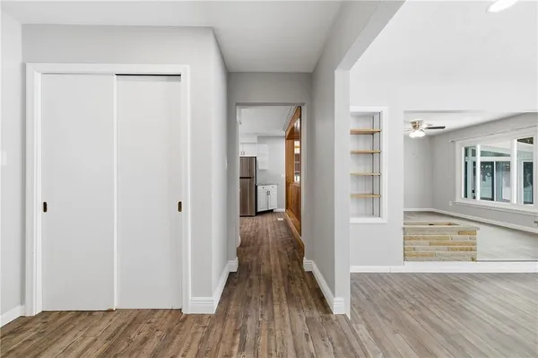 a view of a bedroom from the hallway
