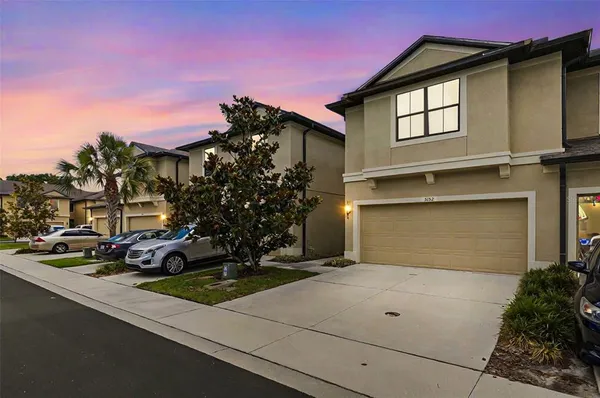 front view of a house with a street