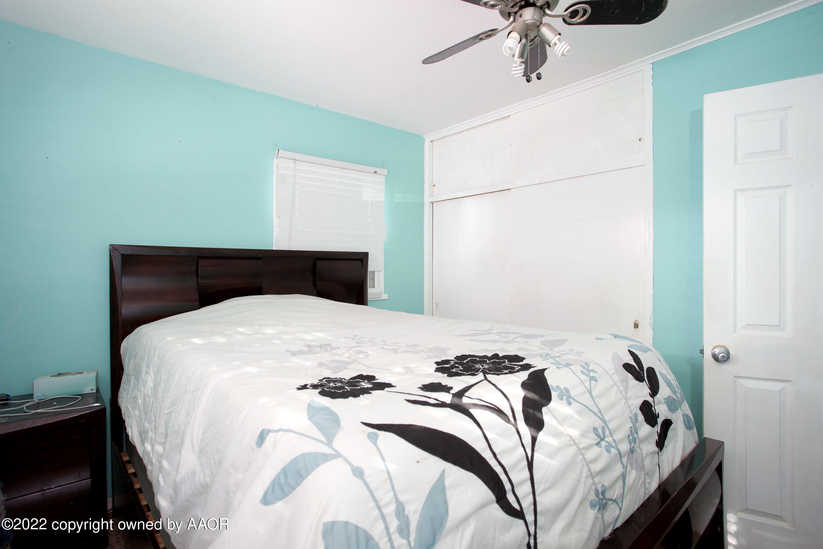 5310 Tumbleweed Drive Amarillo, TX 79110 - Photo 15 of 23 a bedroom with a bed and window
