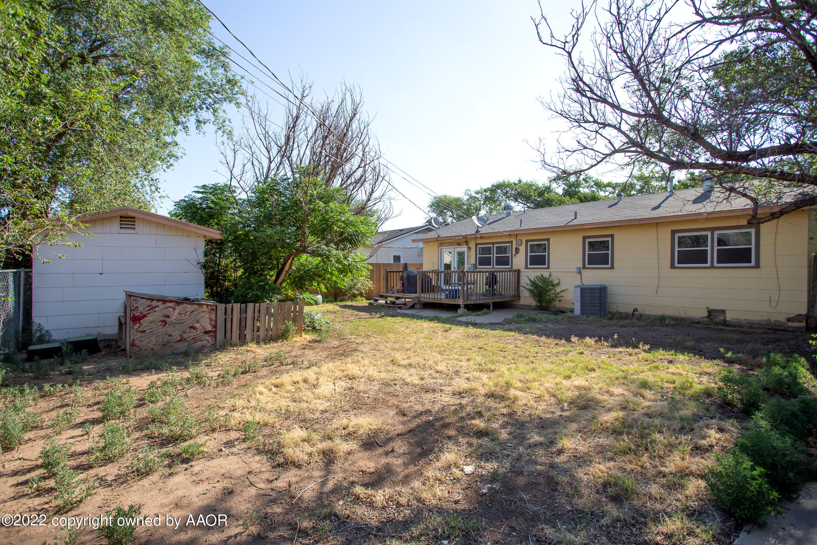 5310 Tumbleweed Drive Amarillo, TX 79110 - Photo 20 of 23 a view of a house with a yard covered with snow in front of house