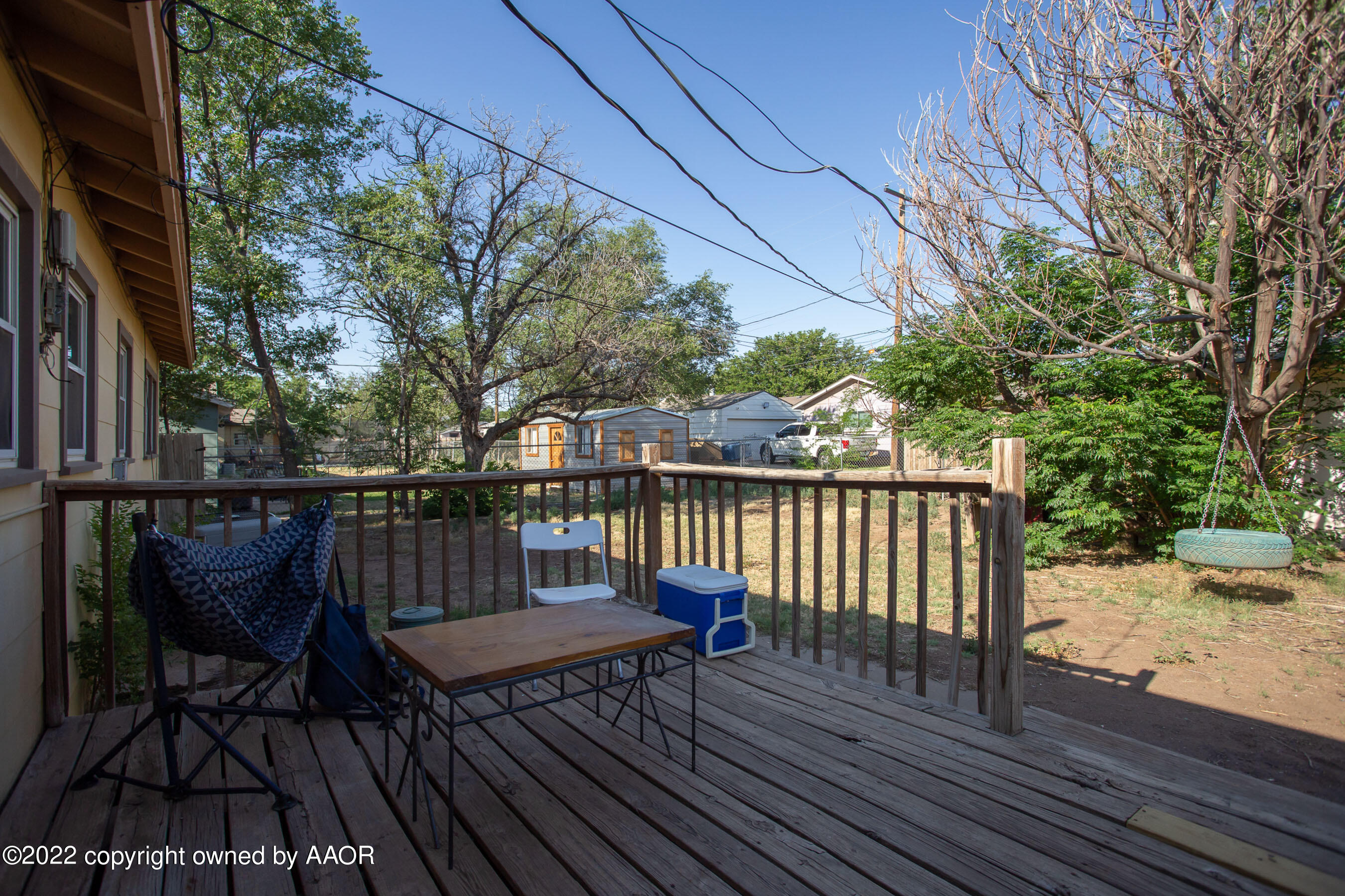5310 Tumbleweed Drive Amarillo, TX 79110 - Photo 21 of 23 a view of balcony with wooden floor and outdoor seating
