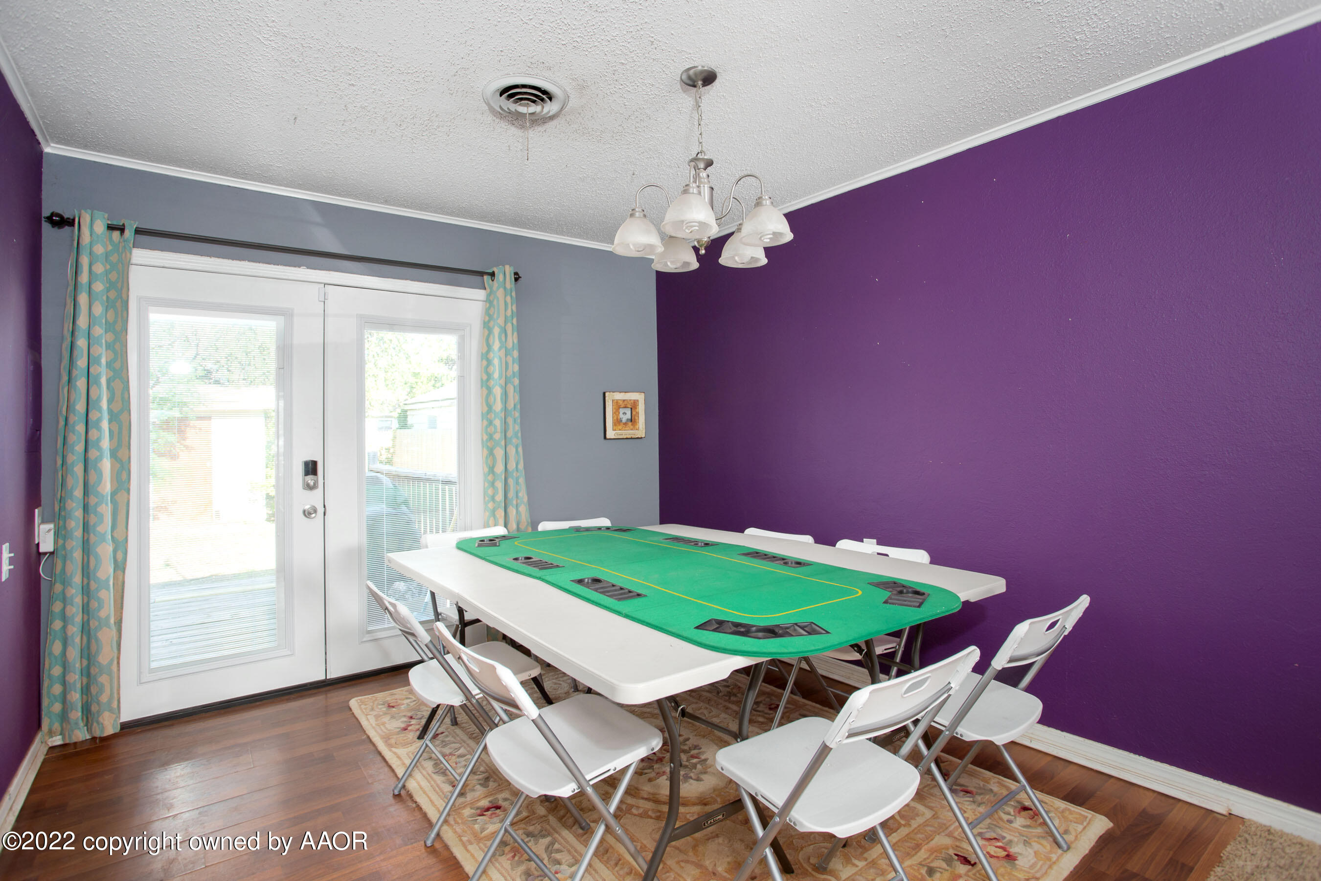 5310 Tumbleweed Drive Amarillo, TX 79110 - Photo 8 of 23 a view of a dining room with furniture window and wooden floor