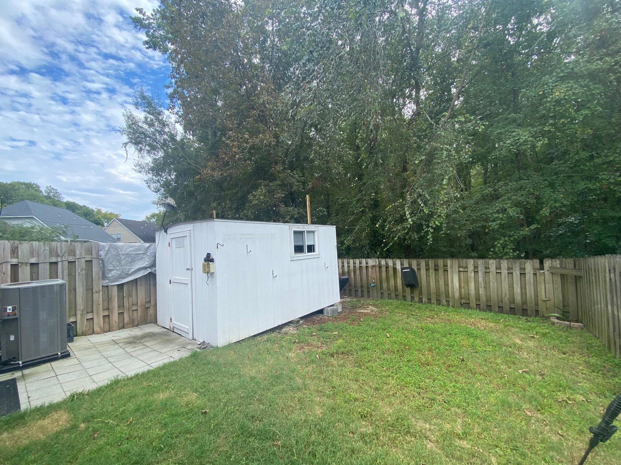 9238 Ayscough Road Summerville, SC 29485 - Photo 5 of 36 Fenced Backyard with Storage Shed
