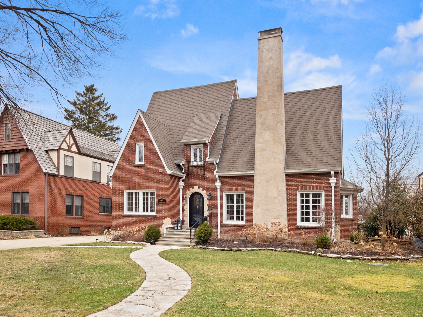 611 Wisner Street Park Ridge, IL 60068 - Photo 1 of 36 a front view of a house with a swimming pool