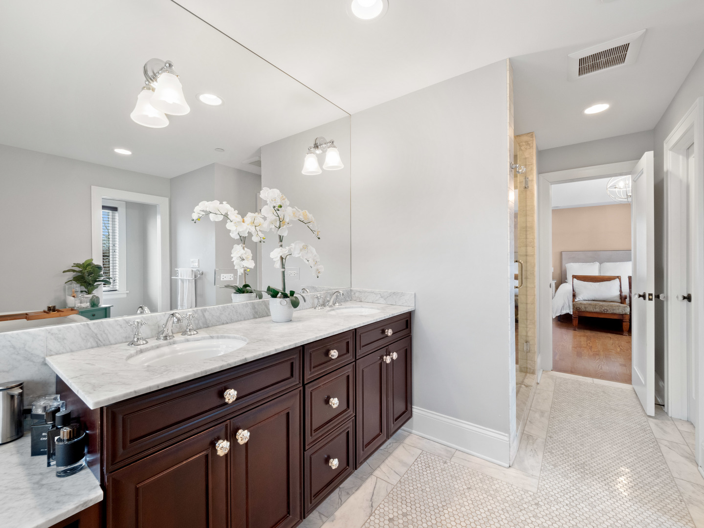 611 Wisner Street Park Ridge, IL 60068 - Photo 18 of 36 a en suite bathroom with a sink double vanity and a mirror