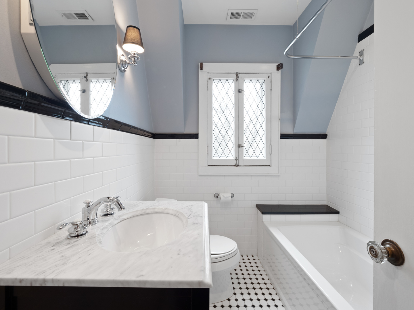 611 Wisner Street Park Ridge, IL 60068 - Photo 25 of 36 a bathroom with a sink toilet and shower