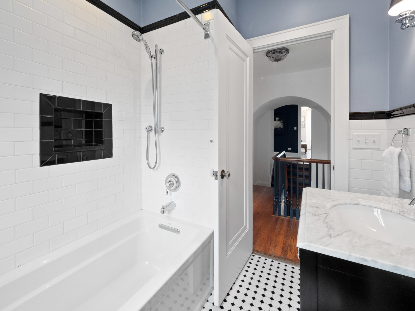 611 Wisner Street Park Ridge, IL 60068 - Photo 26 of 36 a bathroom with a bathtub and a shower