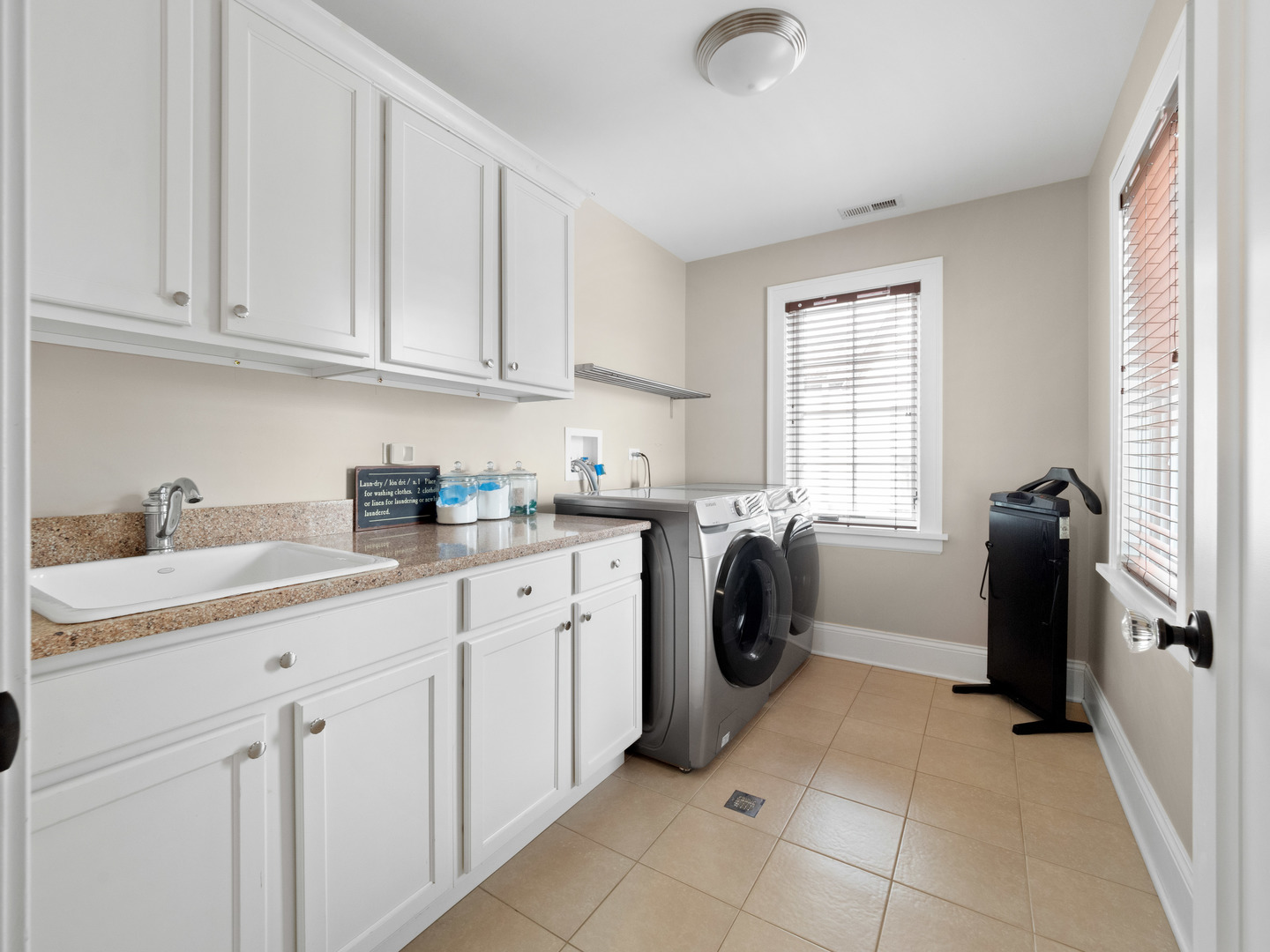 611 Wisner Street Park Ridge, IL 60068 - Photo 29 of 36 a kitchen with a refrigerator sink and cabinets