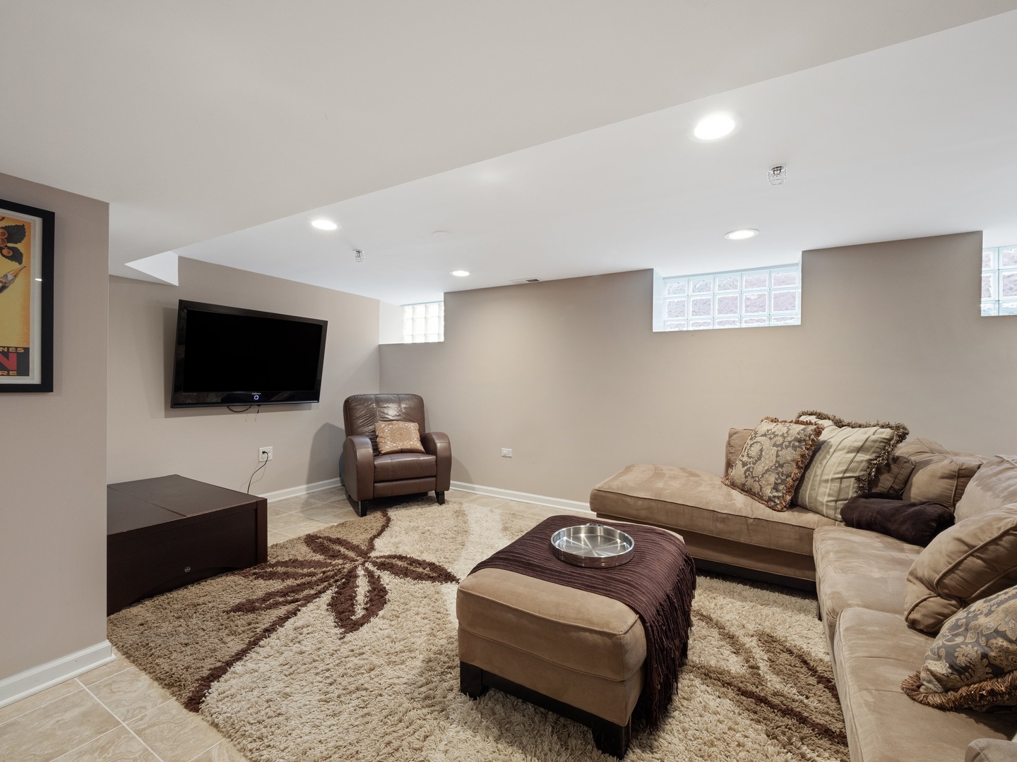 611 Wisner Street Park Ridge, IL 60068 - Photo 30 of 36 a living room with furniture and a flat screen tv