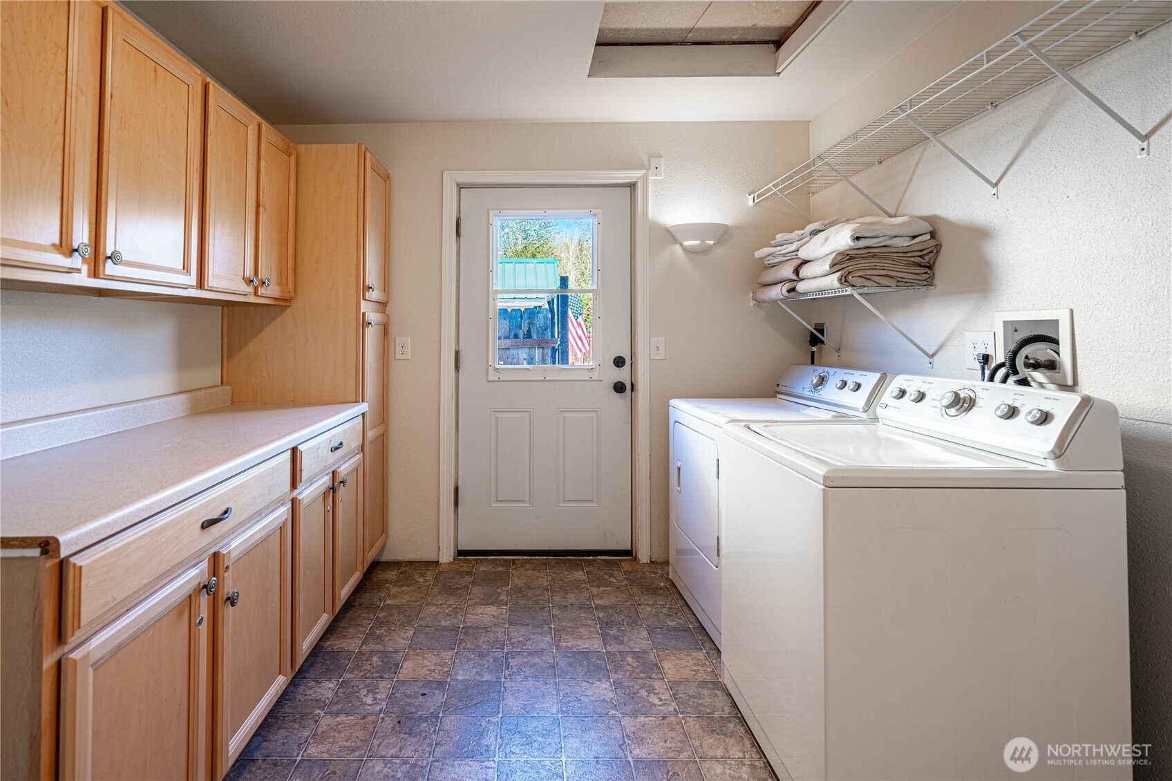 145 North Harris Avenue Manson, WA 98831 - Photo 16 of 28 a utility room with dryer and washer