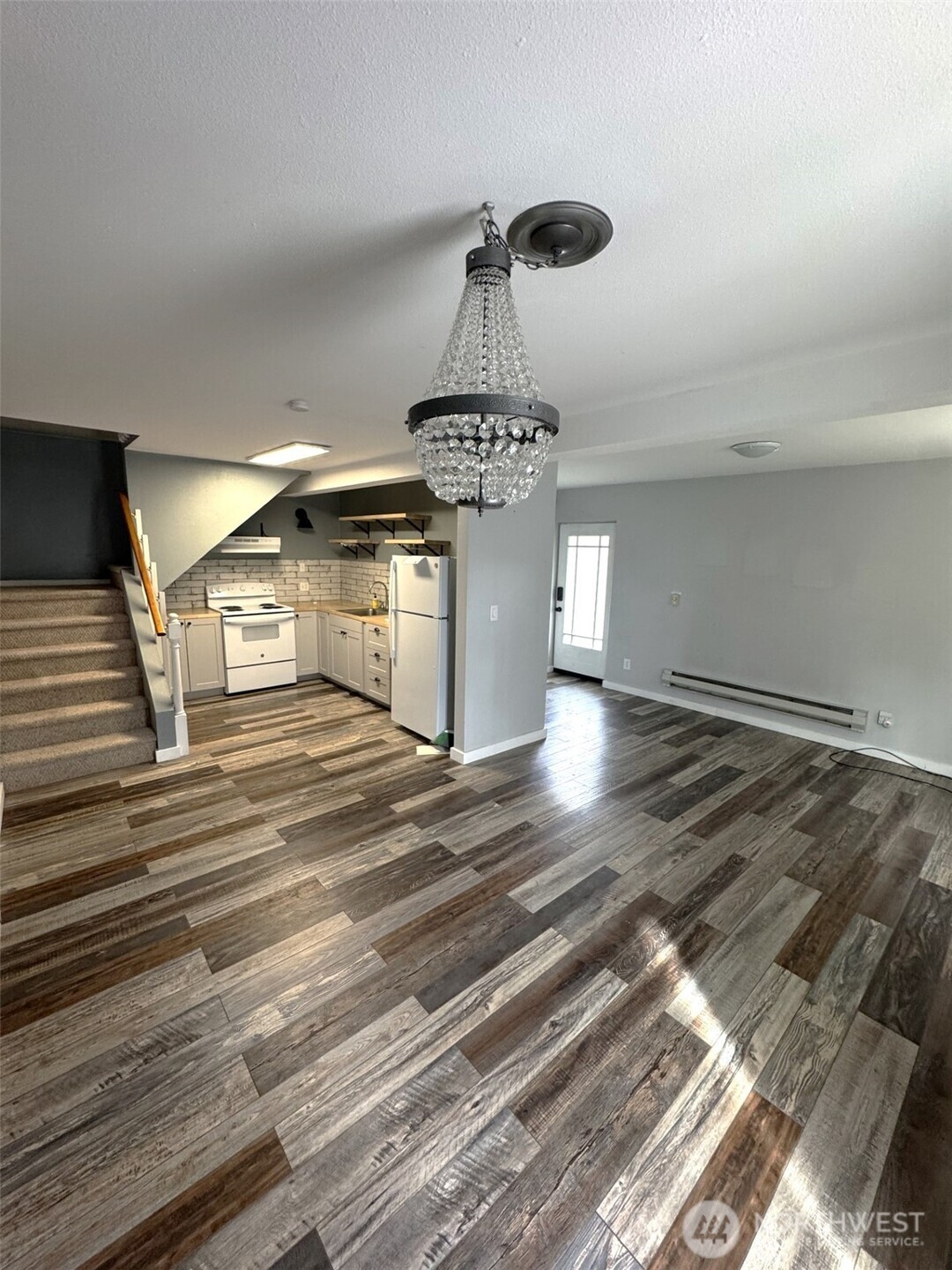 145 North Harris Avenue Manson, WA 98831 - Photo 20 of 28 a room with lot of chandelier gym equipment