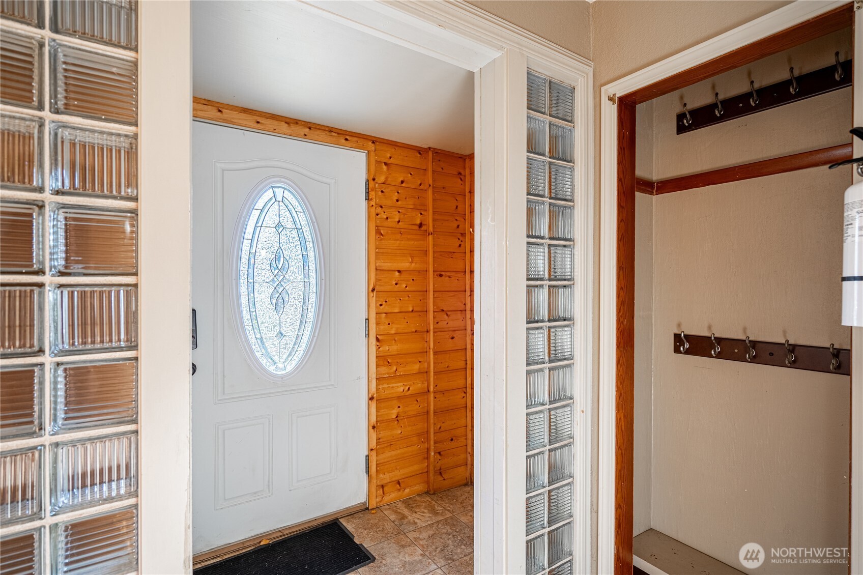 145 North Harris Avenue Manson, WA 98831 - Photo 3 of 28 a front view of a house with entryway