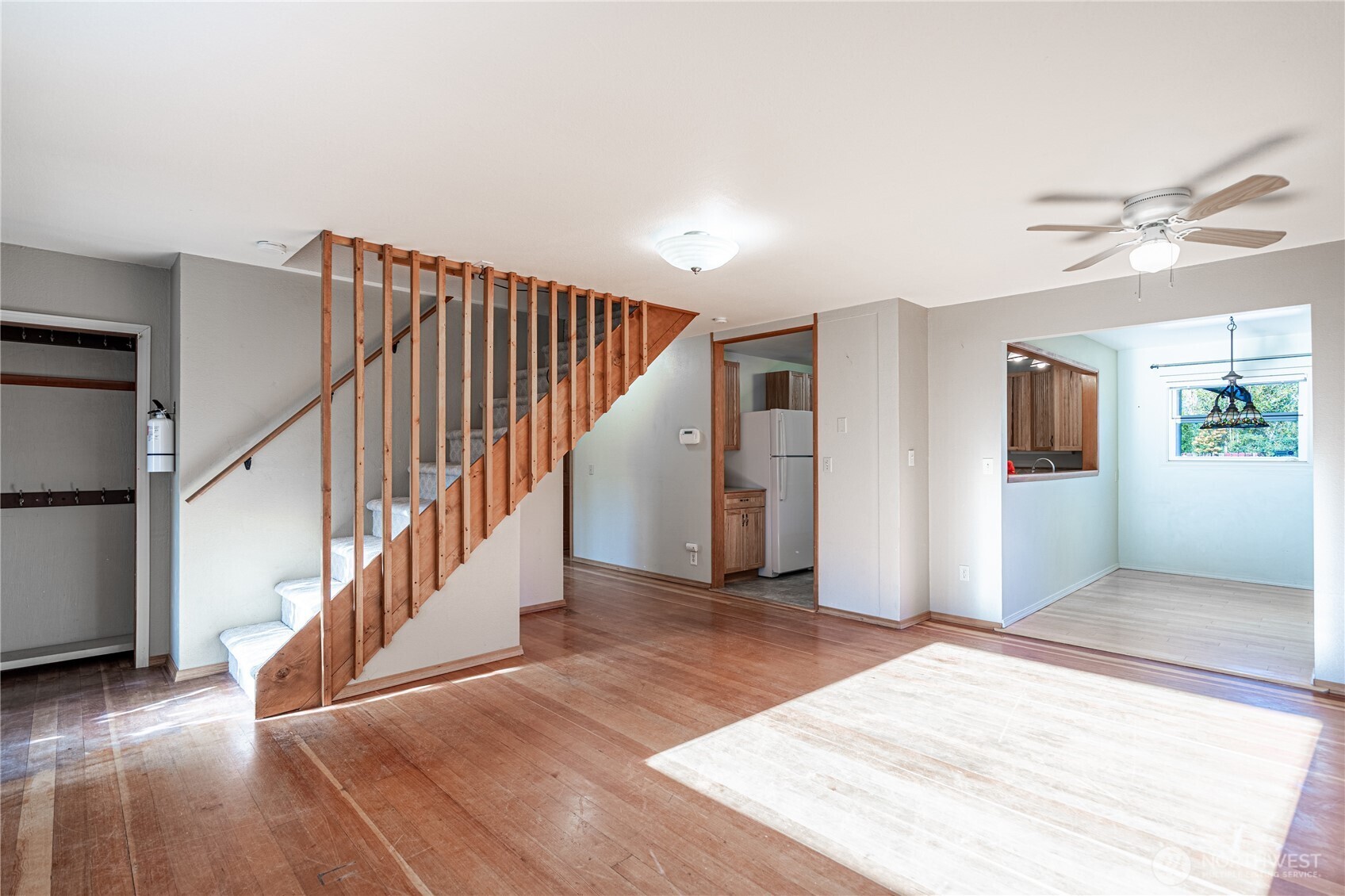 145 North Harris Avenue Manson, WA 98831 - Photo 6 of 28 a view of entryway and hall with wooden floor