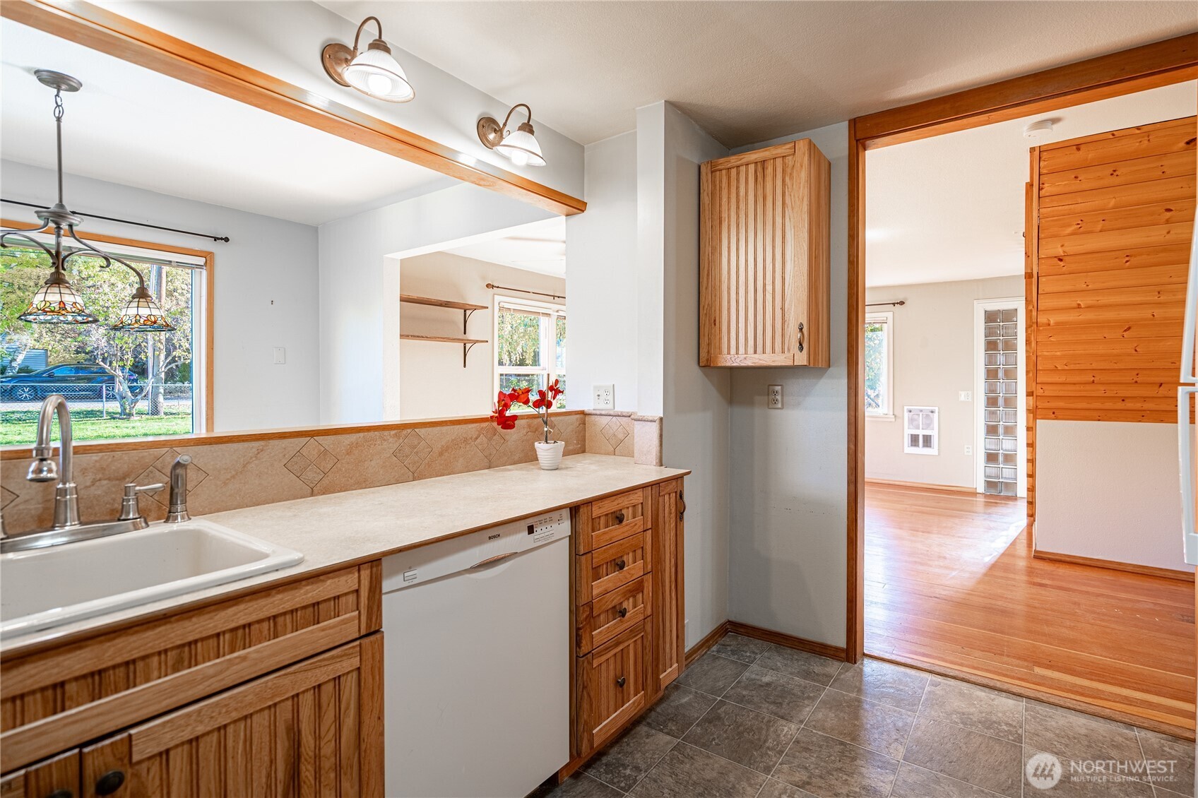145 North Harris Avenue Manson, WA 98831 - Photo 10 of 28 a kitchen with a sink and a window