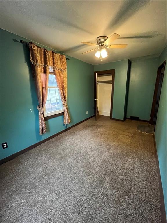 123 Highway 68 Rochester, PA 15074 - Photo 15 of 36 an empty room with windows and closet